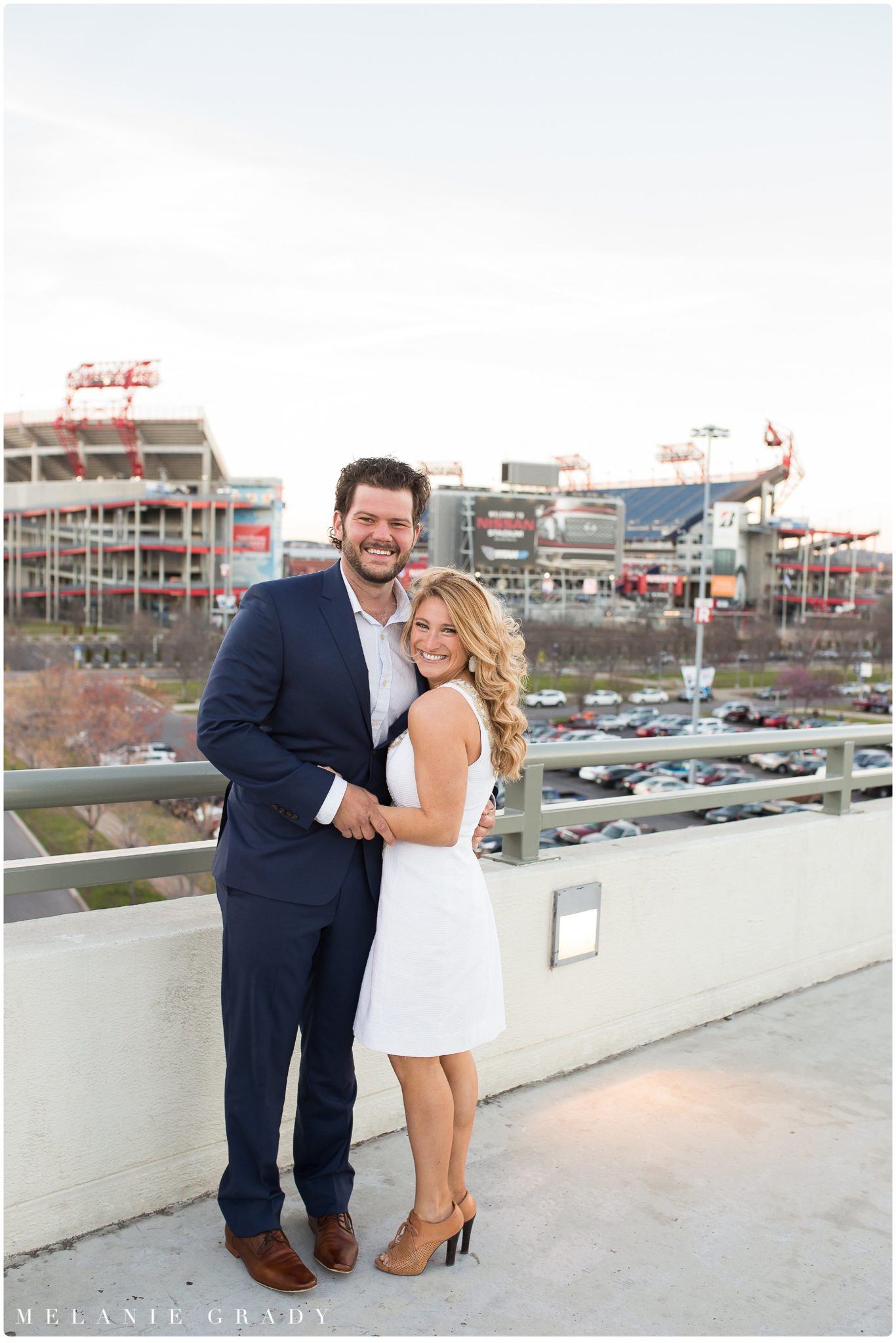 Nashville engagement photographer, downtown Nashville engagement session, , The Pedestrian Bridge, Nissan Stadium, southern engagement session, Spring engagement session, engagement session, melanie grady photography, www.melaniegrady.com, country engagement photography, luxury engagement photography, engaged, bride and groom to be, nashville's best wedding photographer, nashville wedding photographer