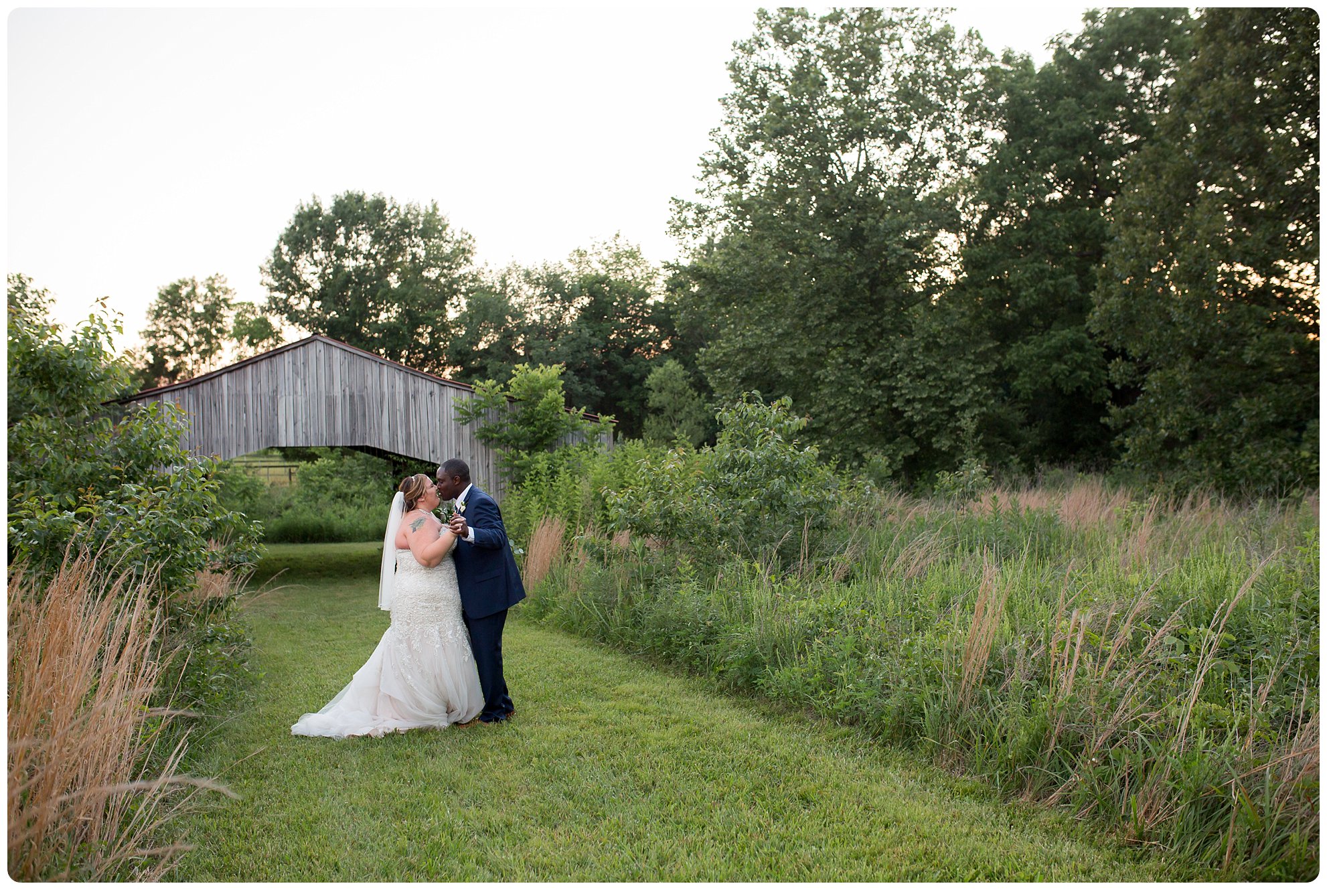 Nashville wedding at Iriswoods, Southern Belles and Blooms, navy tuxedo, whimsical garden wedding, southern wedding, southern bride, nashville bride, melanie grady photography, the best nashville wedding photographer, interracial couple wedding, mt juliet, golden hour portraits