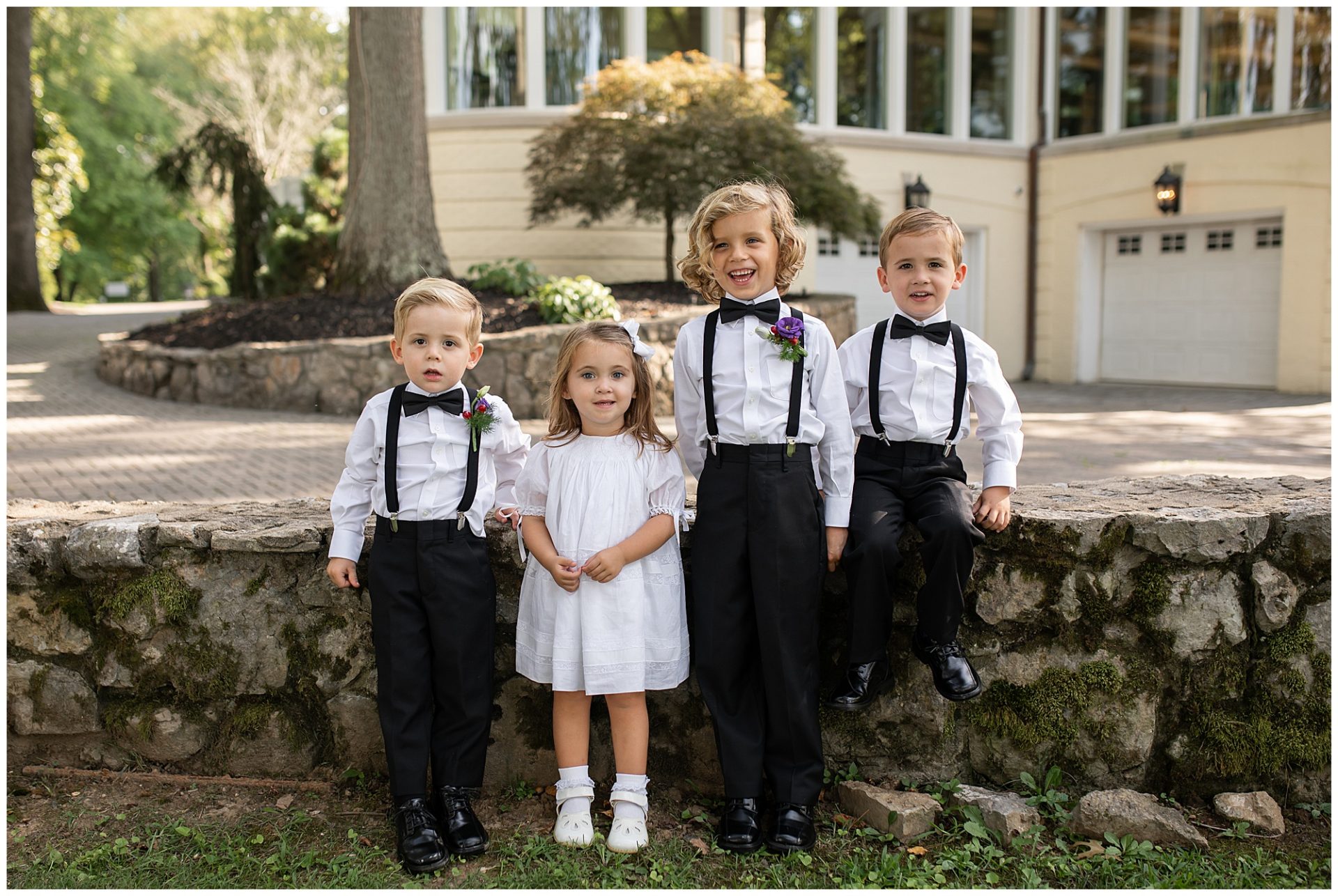 Cutest ring bearers and flower girls at the wedding at the estate at Cherokee dock